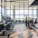fitness center with large open spaces allowing room for workouts and for using equipment